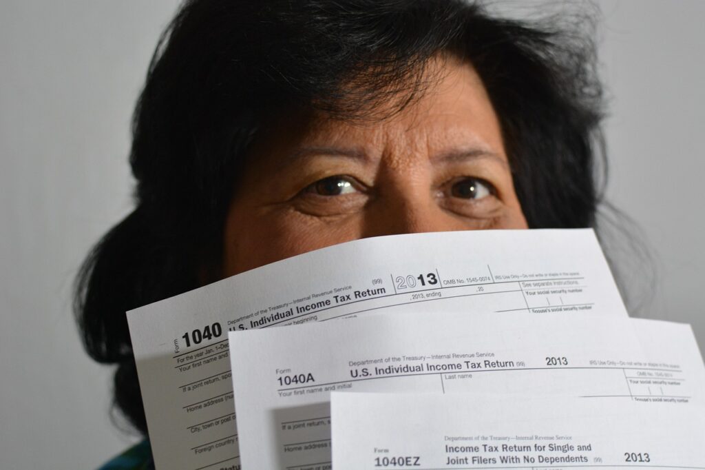 taxes, bills, 1040, woman, incomes, tax, fees, taxes, taxes, taxes, taxes, taxes, tax, tax, tax, fees, fees, fees, fees, fees